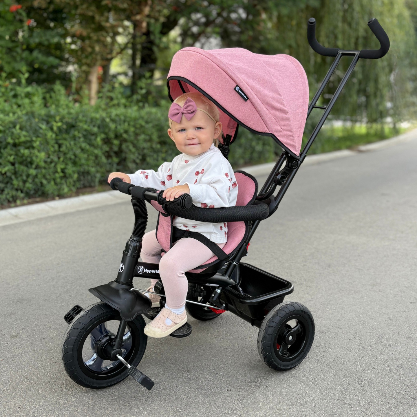 Háromkerekű gyerekeknek 1-4 éves korig - TOBI FREY - rózsaszín szín - forgatható - pumpás kerekek + tolóerő